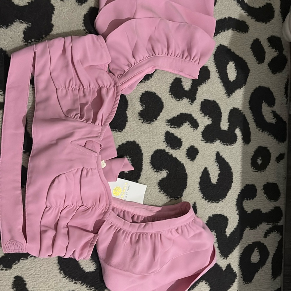 Crop top light pink shirt—new! Size large. The back has a clip and two straps.